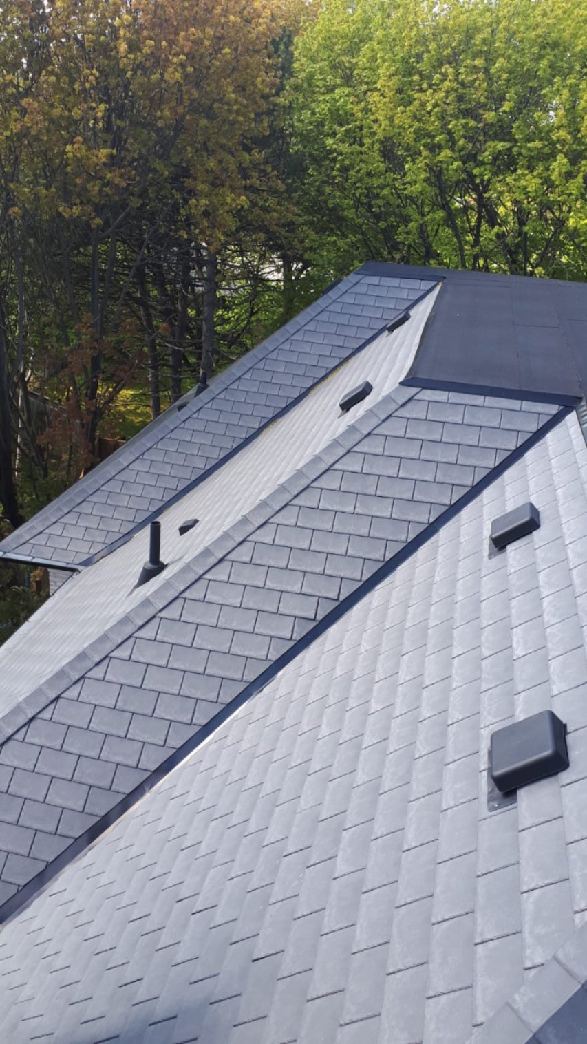 Finished synthetic slate-look composite roof